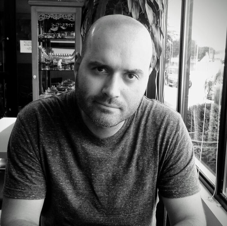 Cover of book with title in white lettering with orange flames.